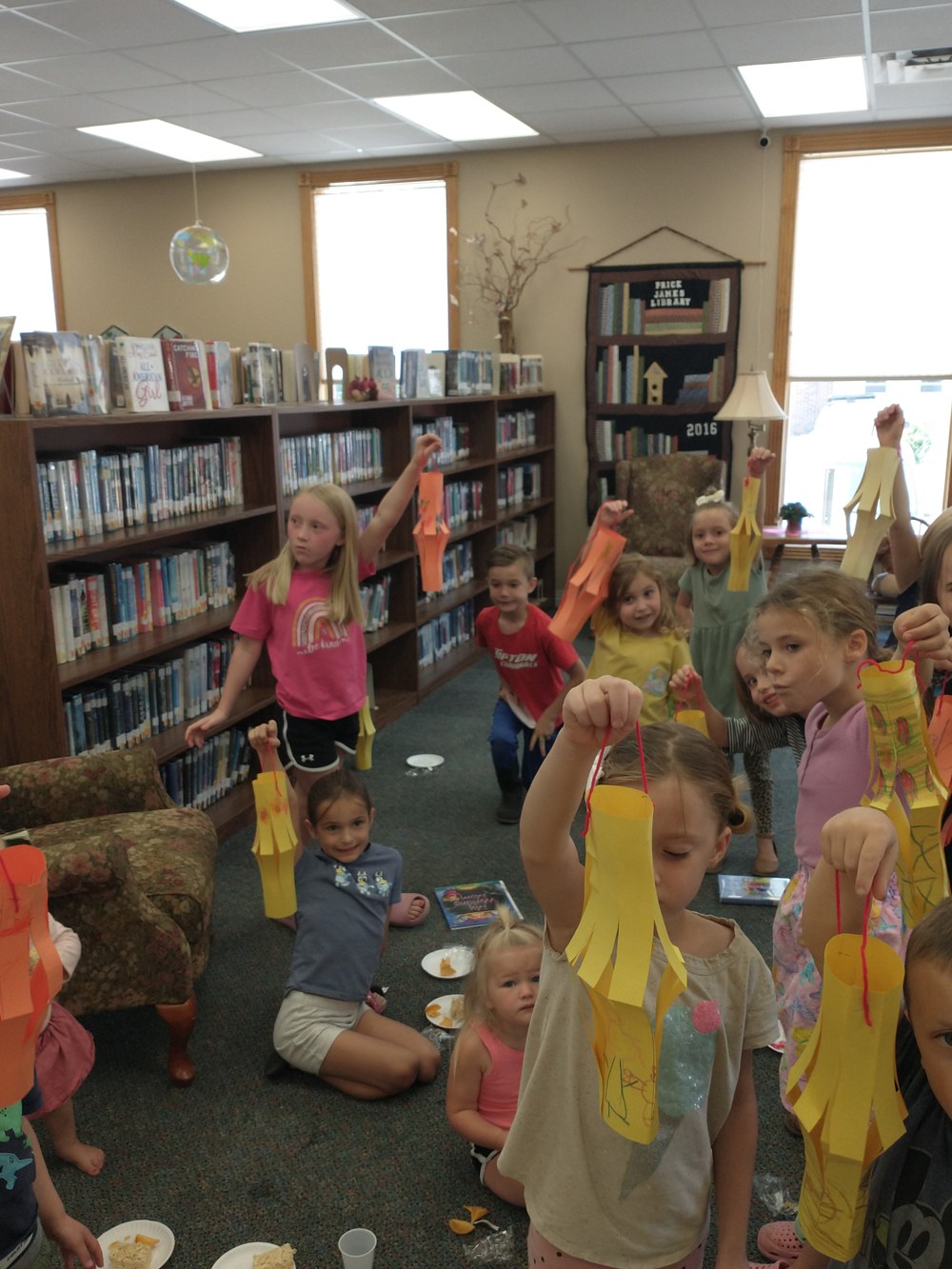 kids holding chinese lanterns